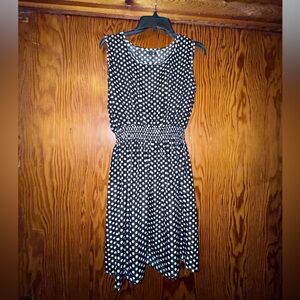 Sleeveless Black Polka Dot Midi Dress with Smocked Waist